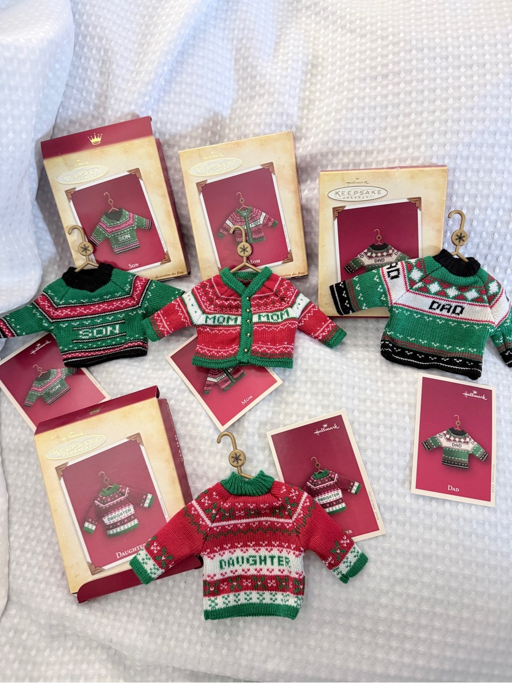 Hallmark Mini Family Sweater Ornaments in Red, Green, White